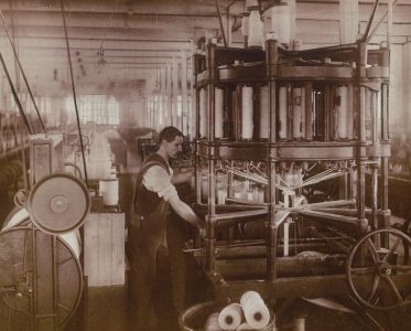 Worker at a machine that makes rope